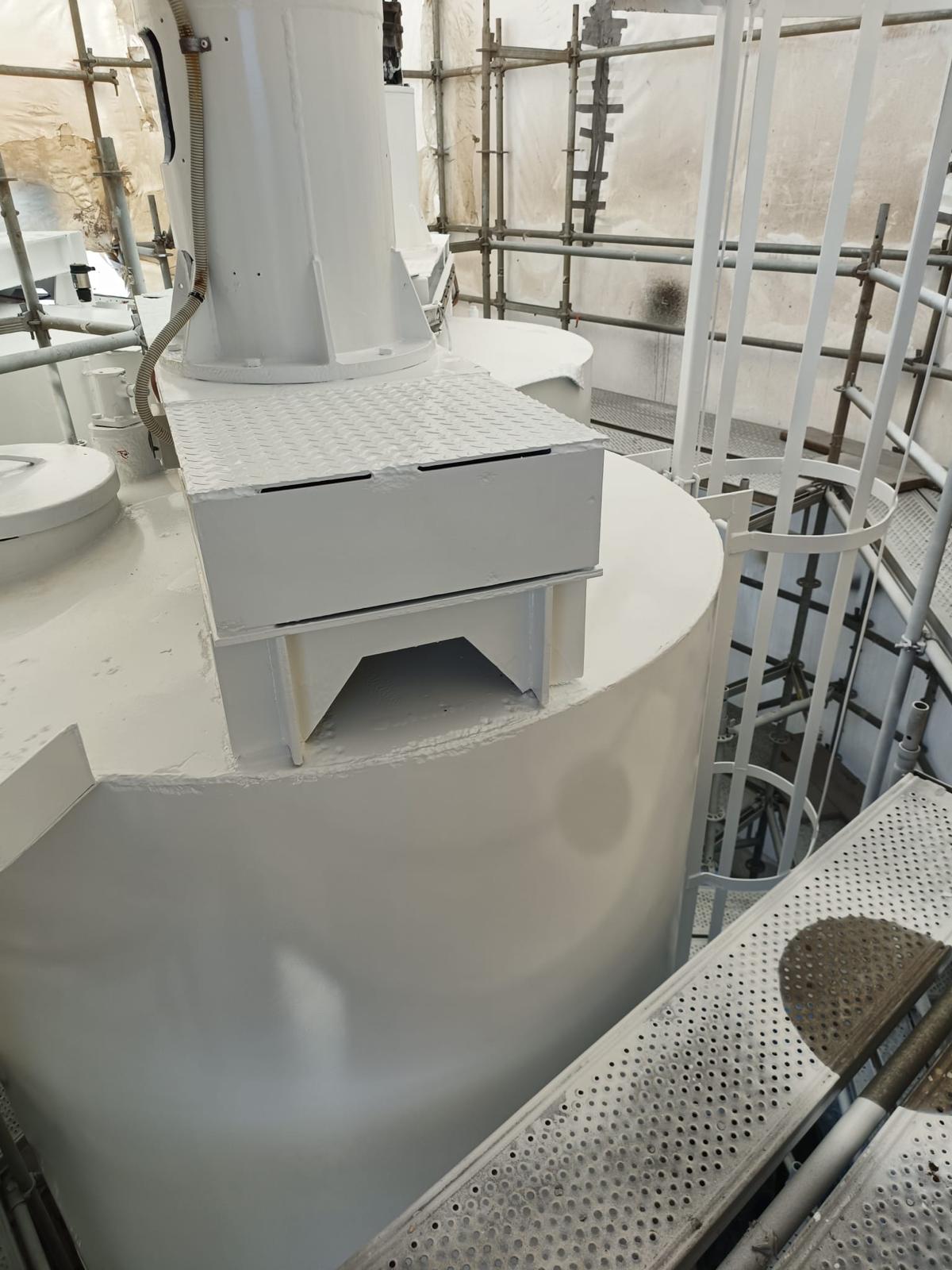 Industrial tank with a completed protective coating