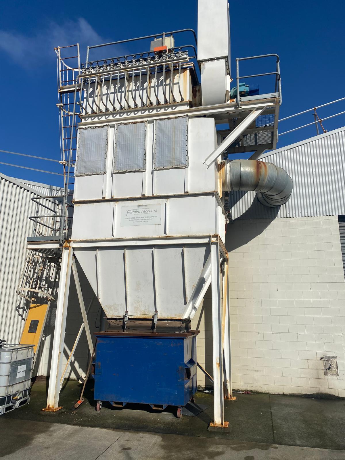 Dust collector with rust and failed coating before restoration