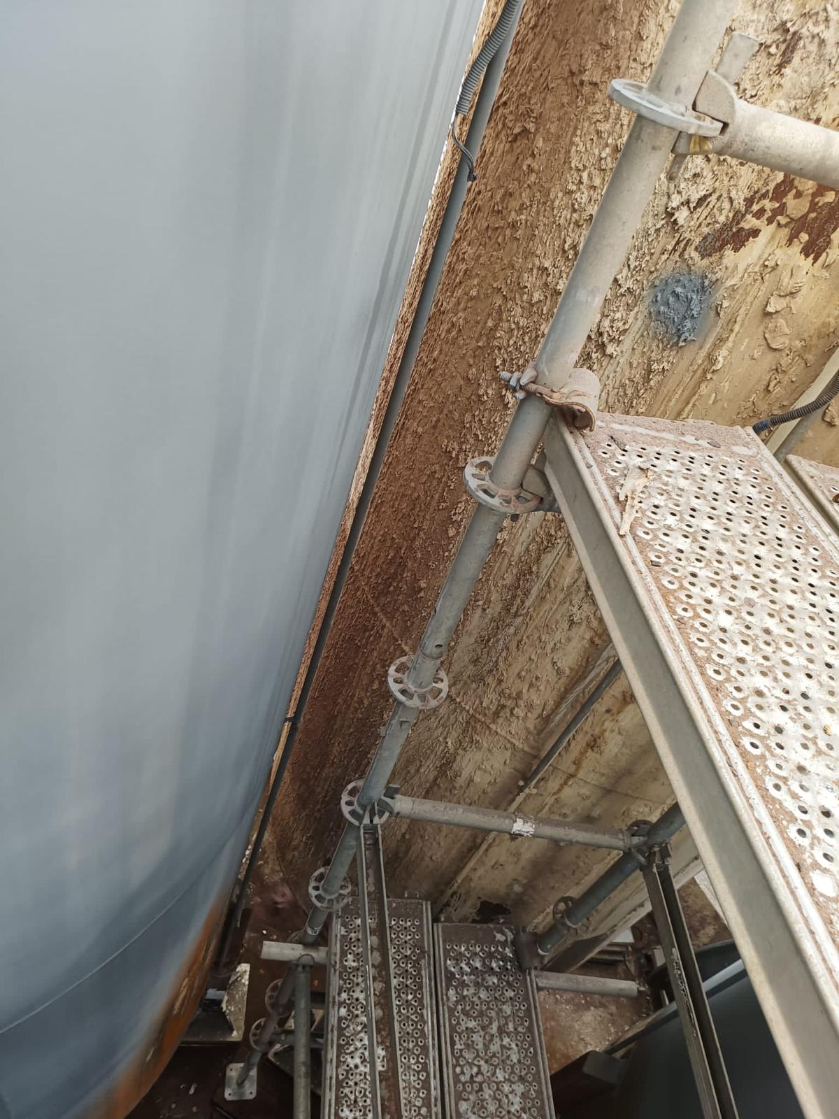 Industrial tank during surface preparation